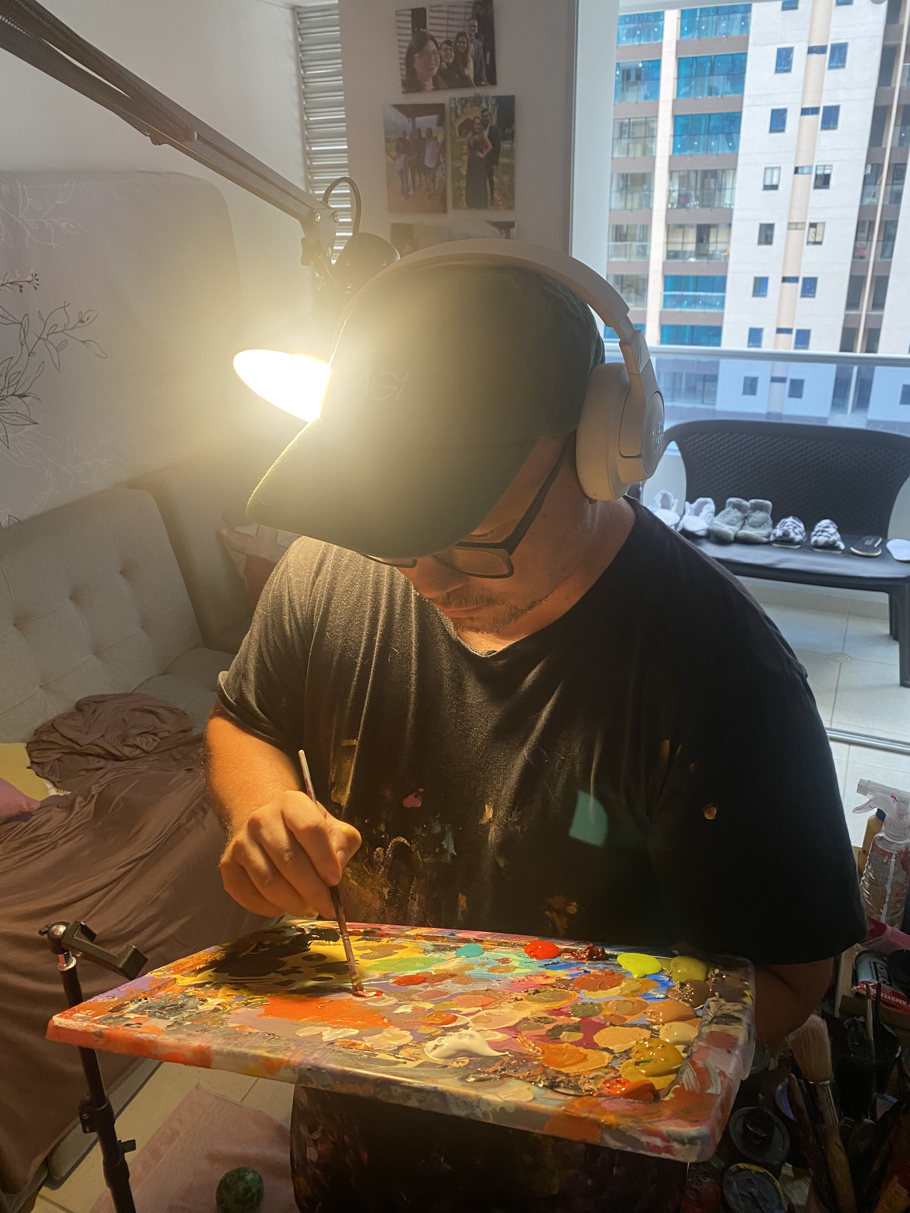 Artist studio with brushes and unfinished canvas